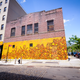 Image for article titled Photos: A “calligraffiti” artist tags buildings with beautiful Arabic calligraphy